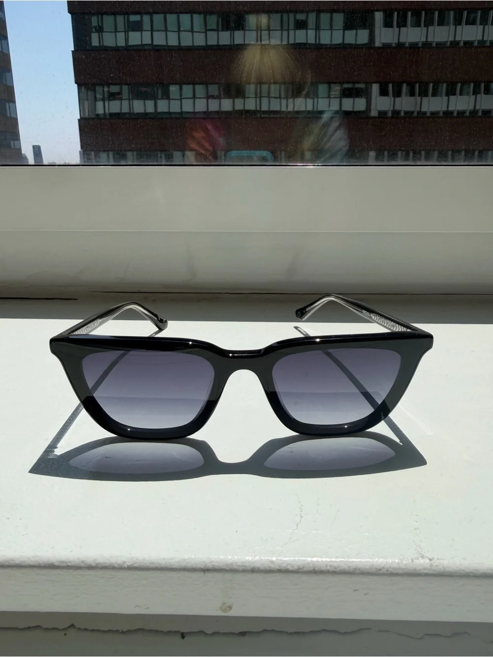 KREWE Black Frame Sunglasses with Gray Gradient Lenses